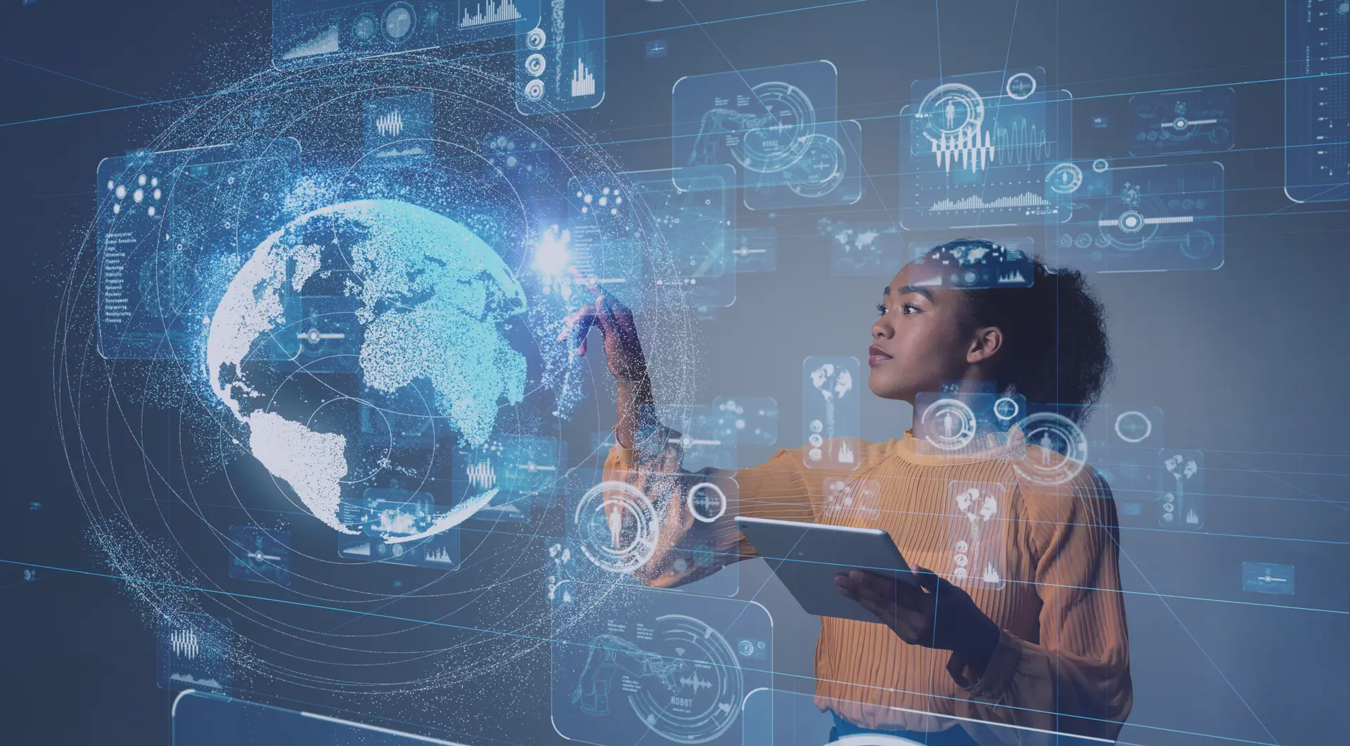 A woman in an orange top touches a glowing holographic globe surrounded by futuristic digital data displays.